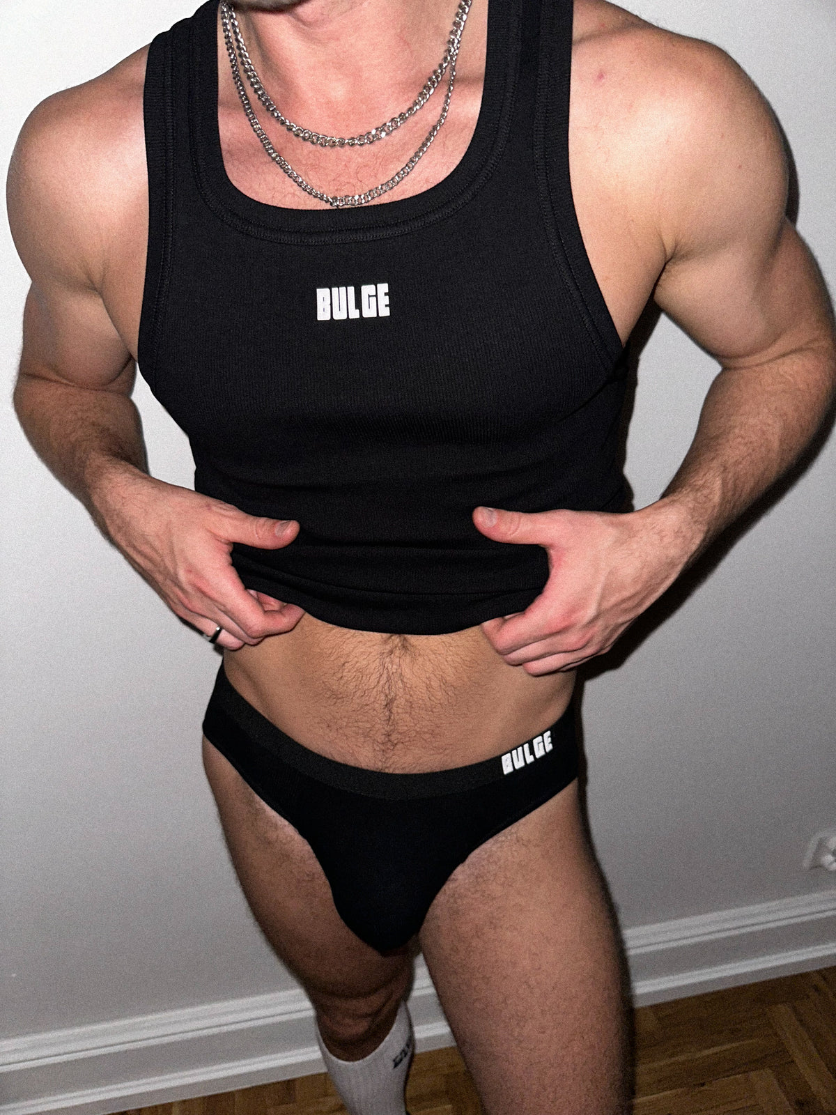 NEXT BRIEFS BULGE · BLACK